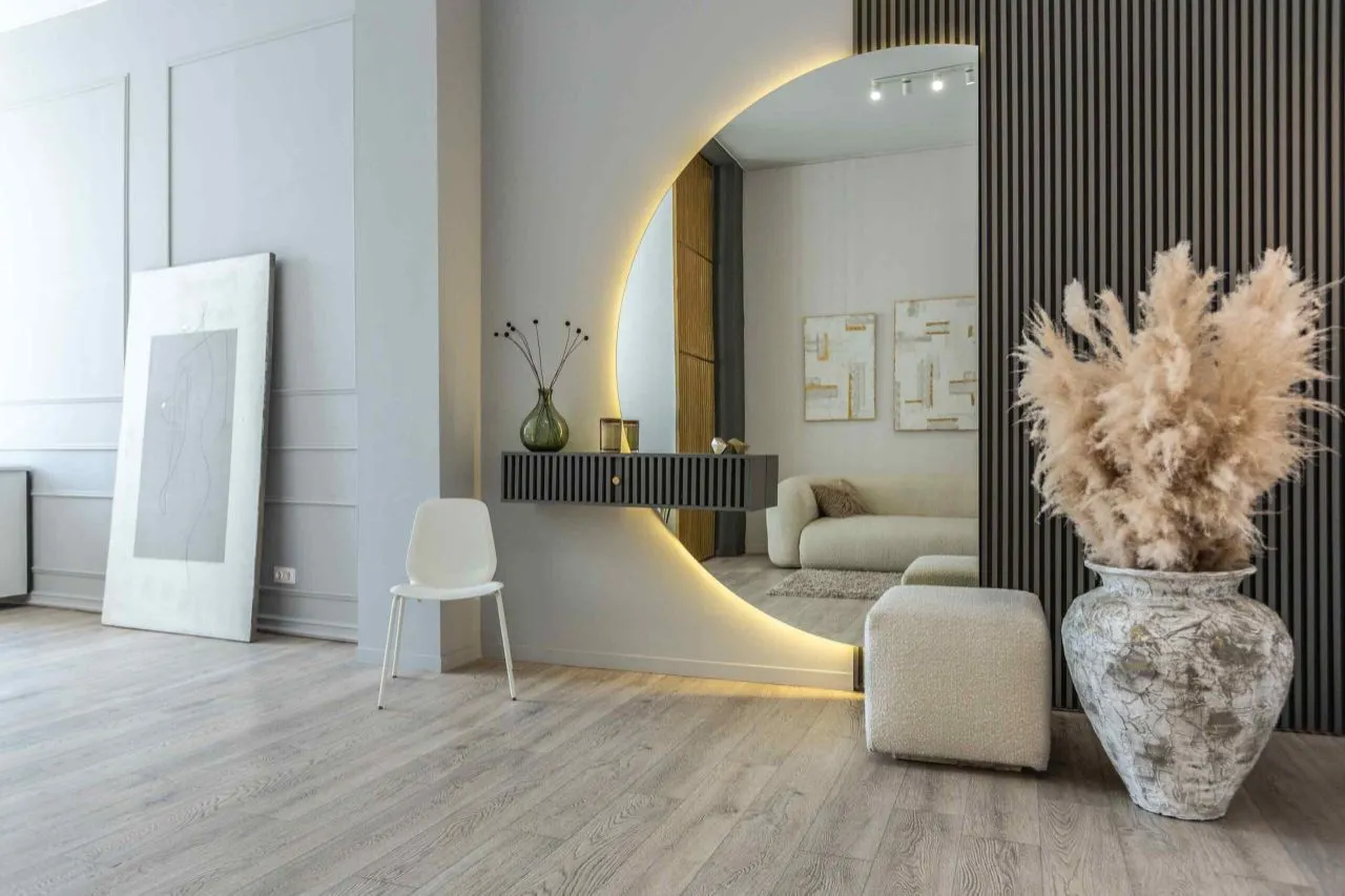 Curved Wall Mirror with Integrated Lighting