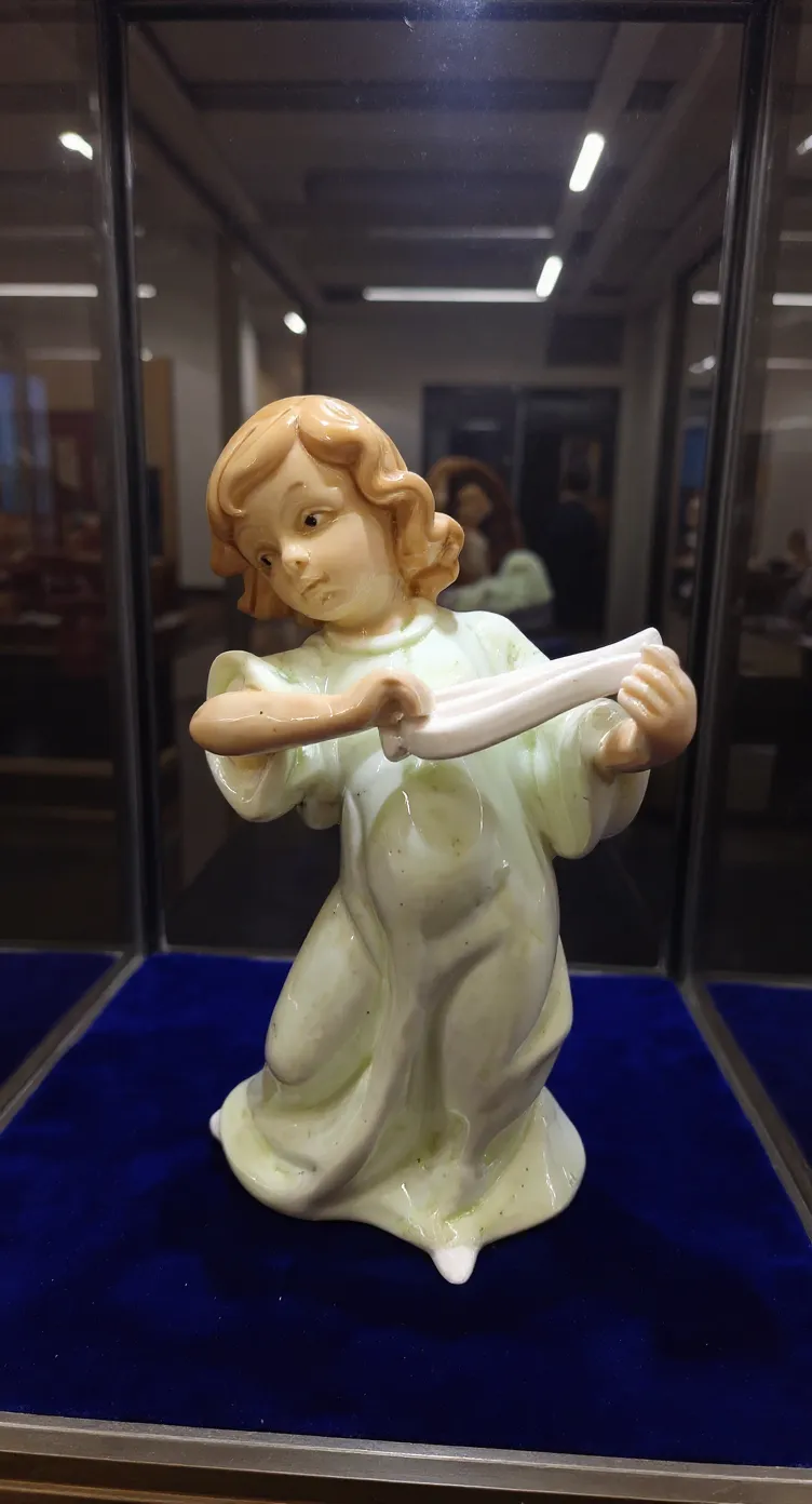 Porcelain Angel Playing Music