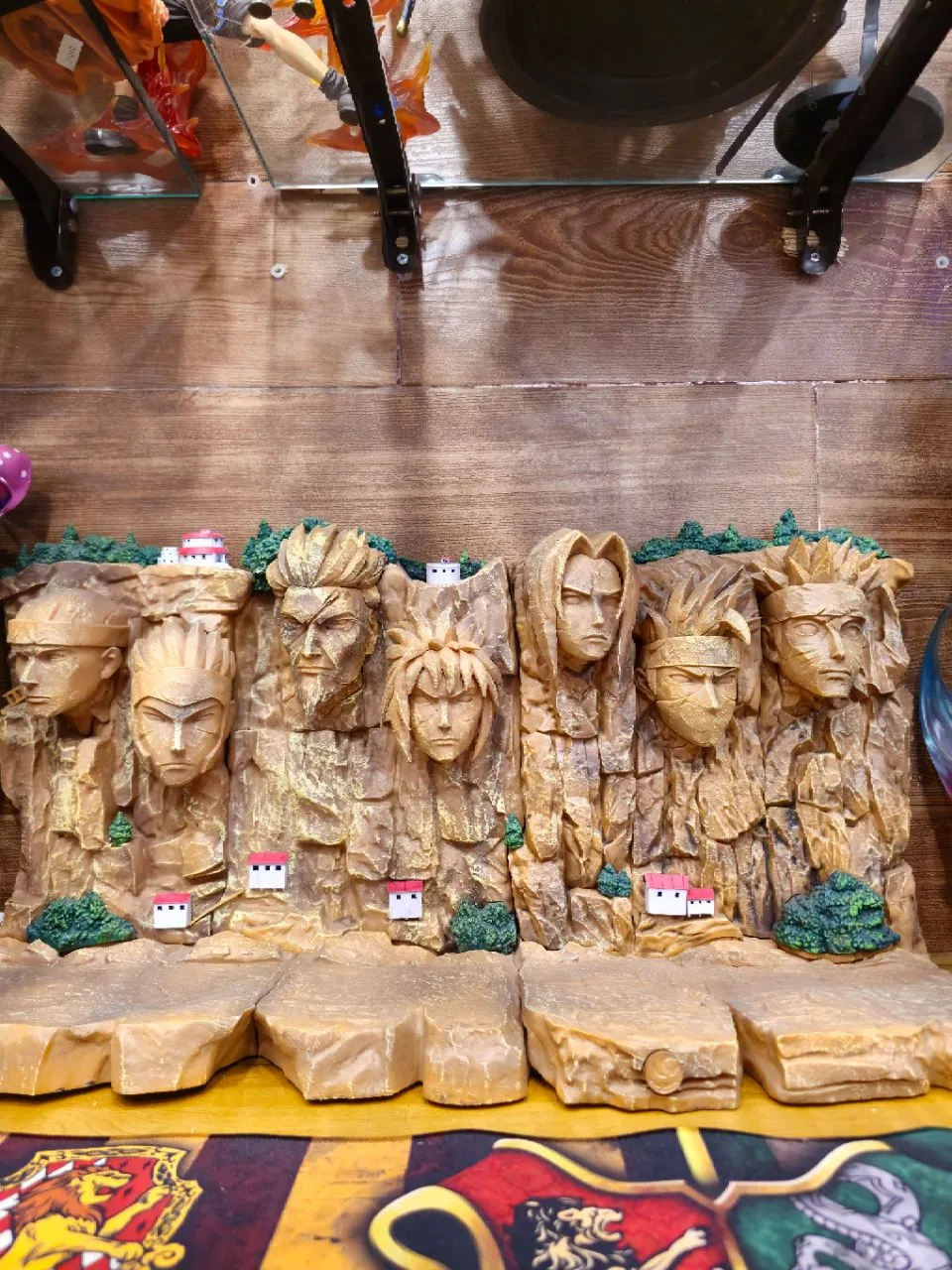 "Carved in stone, the legacy of the Hokage endures."
