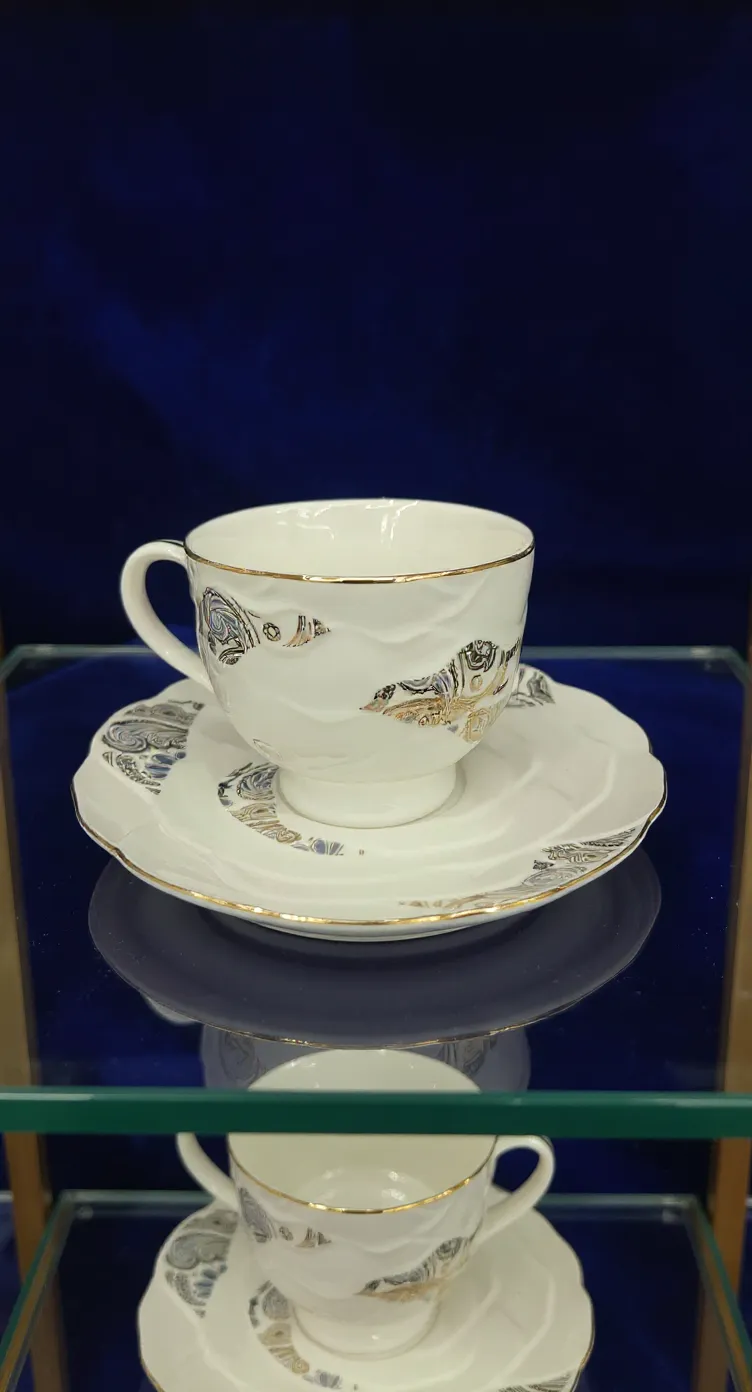 Exquisite Gold-Trimmed Teacup and Saucer