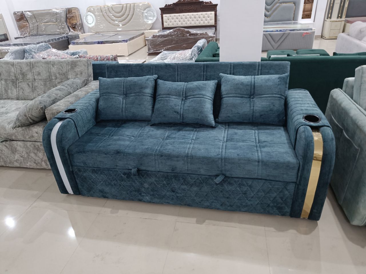 Blue Velvet Sofa Cum Bed with Cup Holders