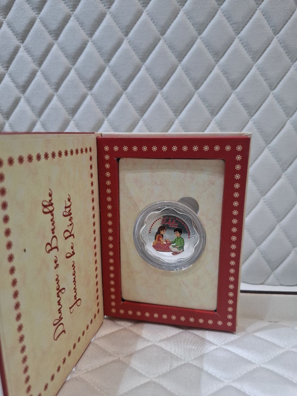Rakhi Silver Coin view 2
