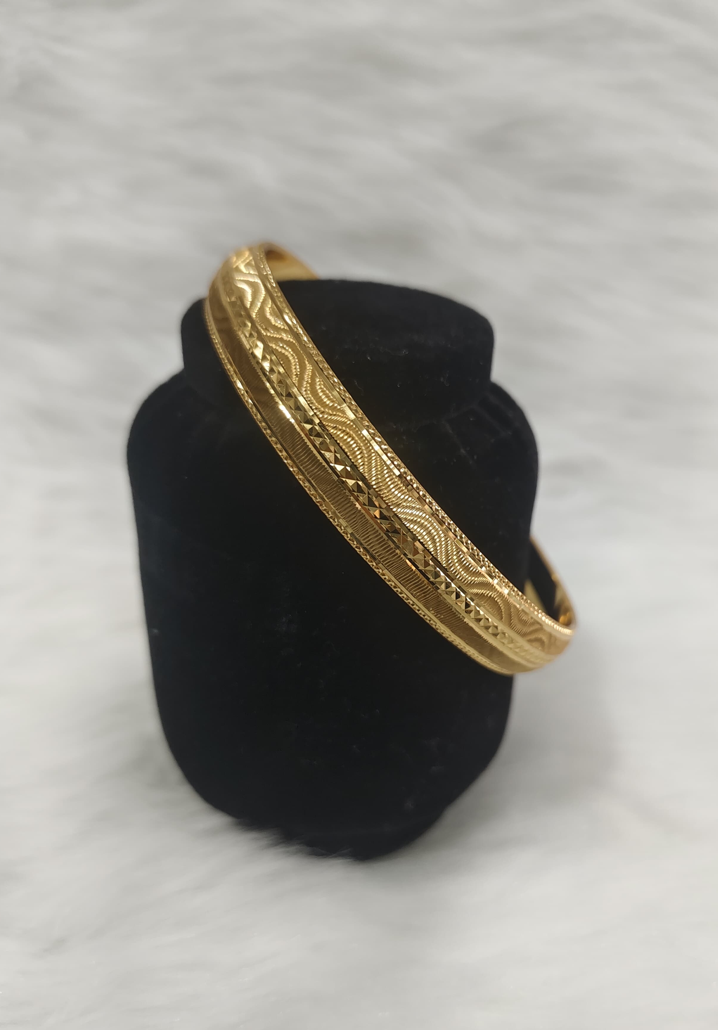 Gold-plated bangle, such as the A V FASHION INDIA minimalist cuff design with etched detailing view 4