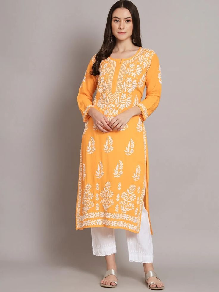PURE COTTON LONG HANDWORK KURTI IN YELLOW.