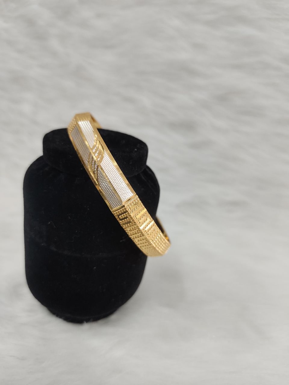 Two-tone men's kada features a distinct CNC line design in yellow gold plating and white rhodium plating view 3