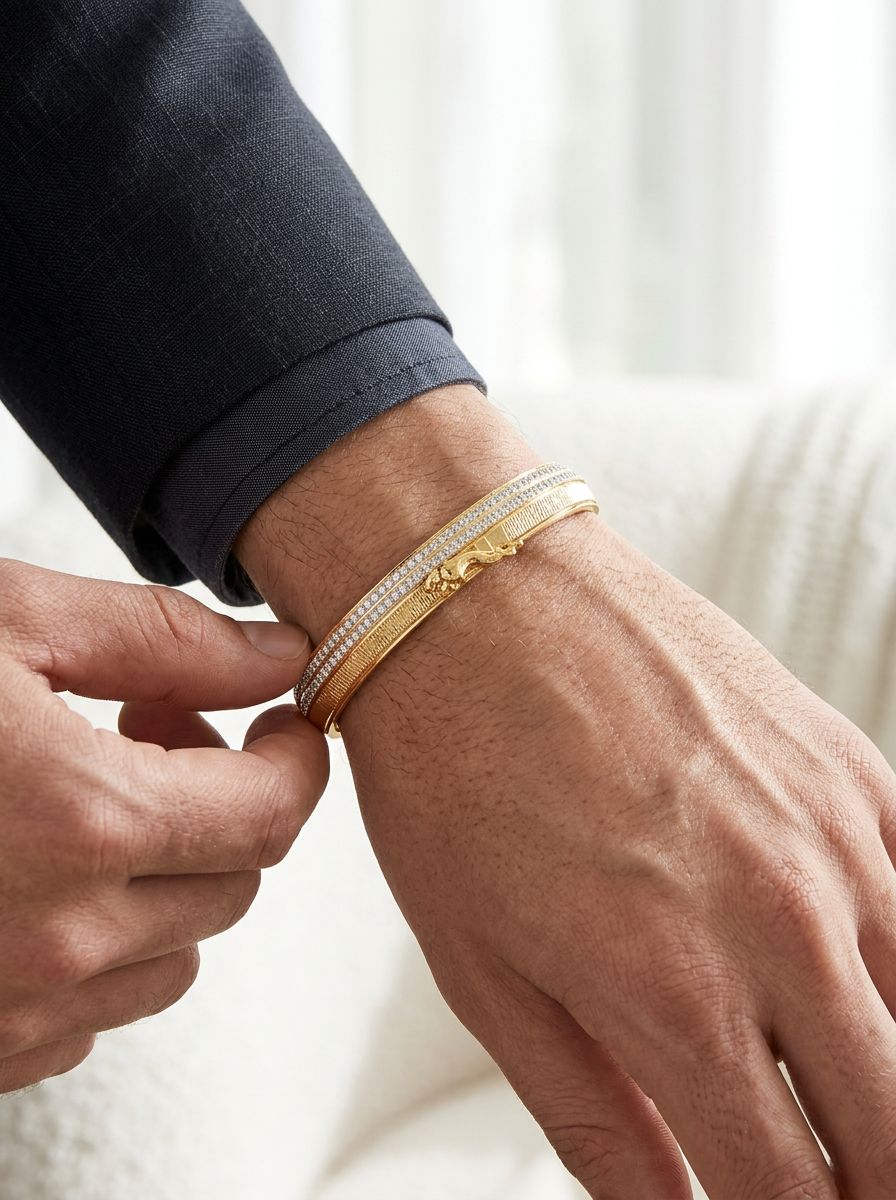 A traditional designer kada featuring a two-tone gold and silver plated design with emosed Jaguar view 3